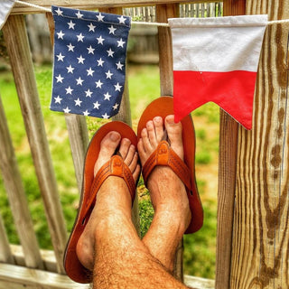 Southern Polished sandals worn on a deck