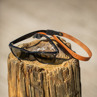 Sunglasses with leather custom sunglass strap. 